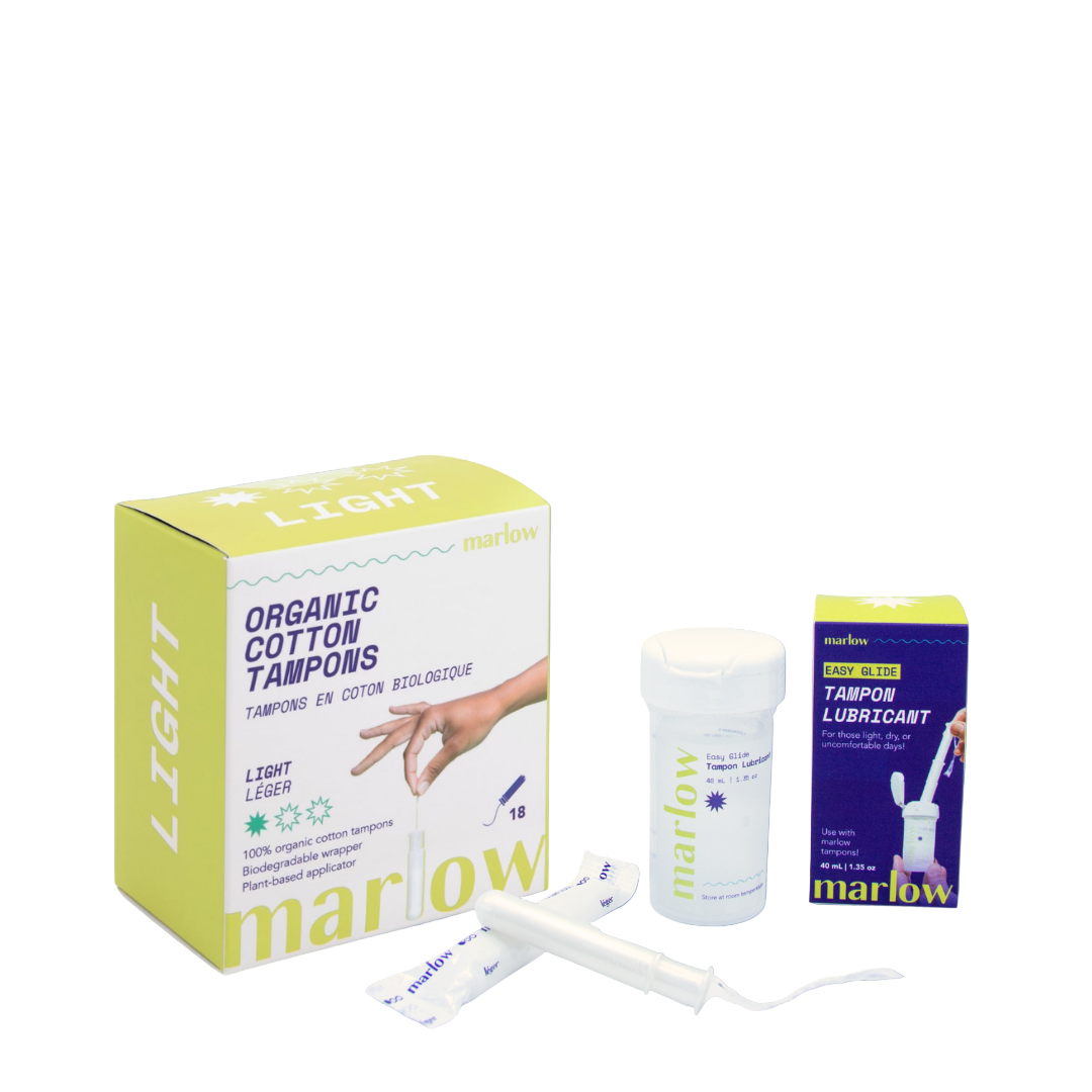 Marlow organic cotton tampons and lubricant on a blue background with 'The Smooth Sailing Bundle' text.